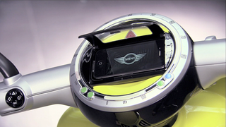 Illustration for article titled BMW Mini E Scooter Is an iPhone Dock On Two Wheels